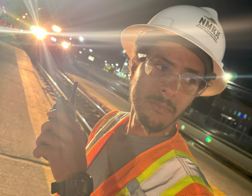 Picture of Rio Metro employee Eric Murphy wearing a hard hat and safety vest 