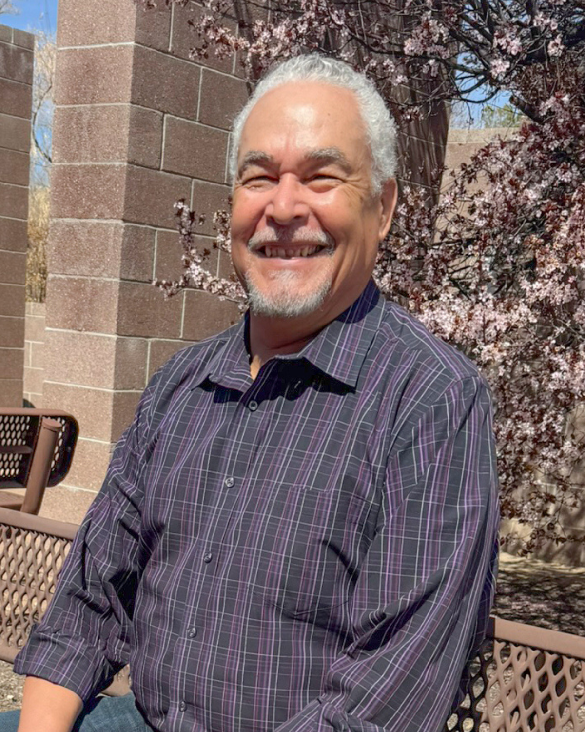 Picture of Frank J Smith sitting outside a facility for Veterans in Albuquerque NM