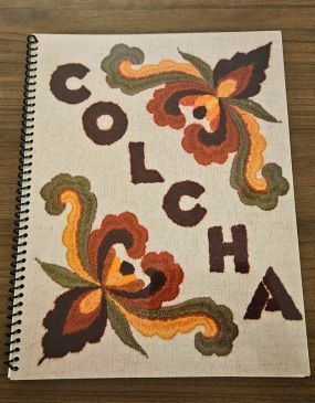 Cover of a spiral bound book titled Colcha