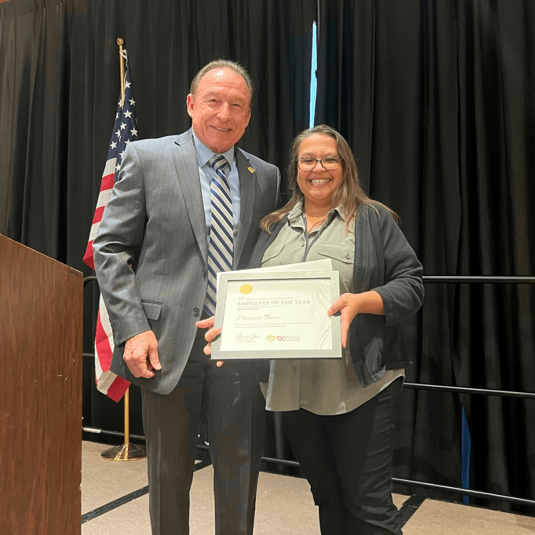 Picture of Workforce Employee of the Year Maxine Baca getting an award
