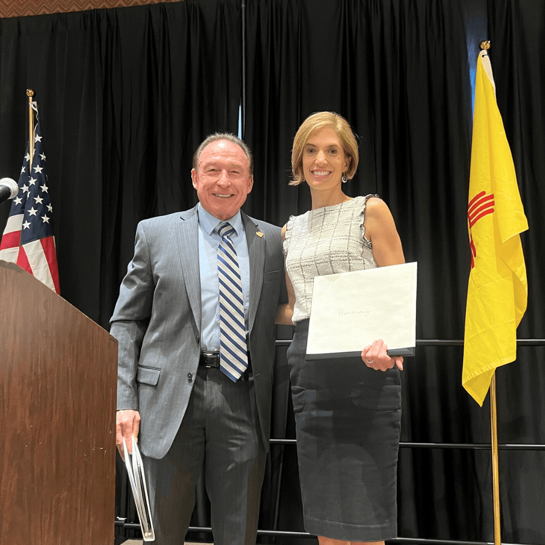 Picture of Rio Metro Employee of the Year Riann Martinez accepting an award